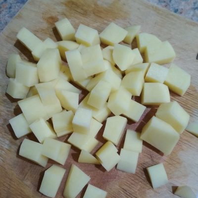 Фото рецепта - Рыбный суп с плавленым сыром и рисом - шаг 2