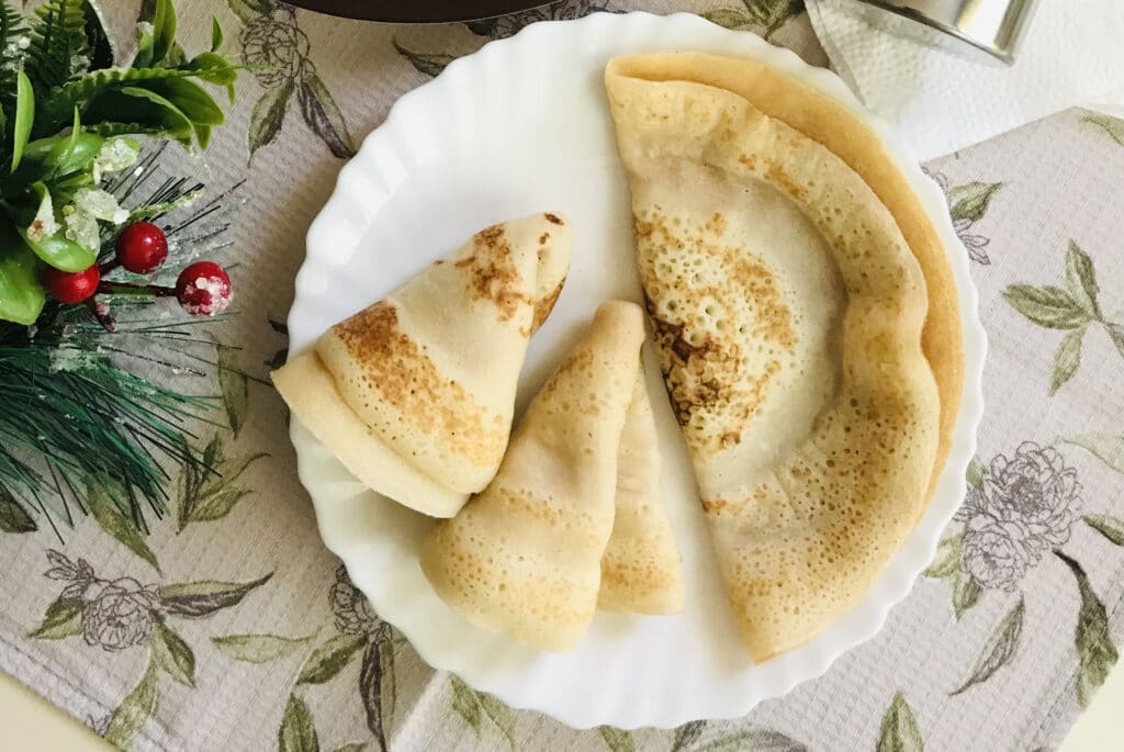 Фото рецепта - Заварные блины на кефире с дырочками - шаг 6