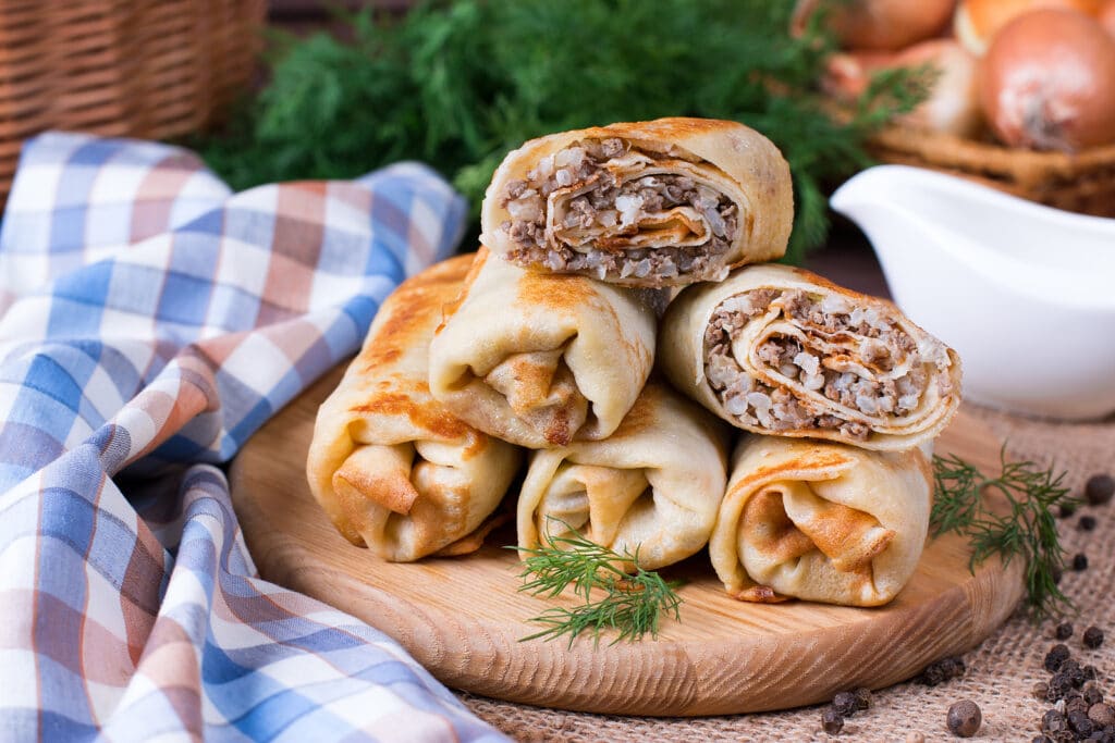 Фото рецепта - Блины с фаршем и рисом - шаг 11